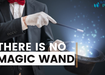 There is no magic wand, a magician with a magic wand showing a trick